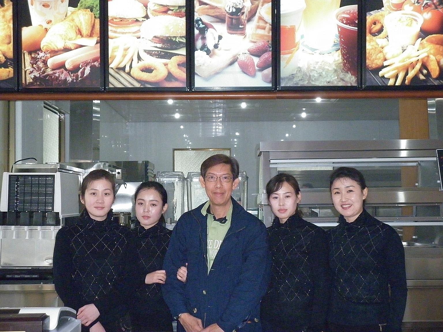 Businessman Patrick Soh, who trained staff and taught them how to make hamburgers for the Samtaesong eatery, said the training went smoothly as the North Koreans were "very polite and disciplined".