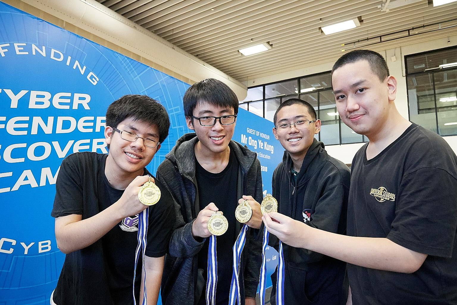 (From left) The quartet from Raffles Junior College - Bryan Juniano, Ooi Ken Jin, Zhang Weiyao and Jaryl Ngoh - won in the category for junior colleges and integrated programme students.