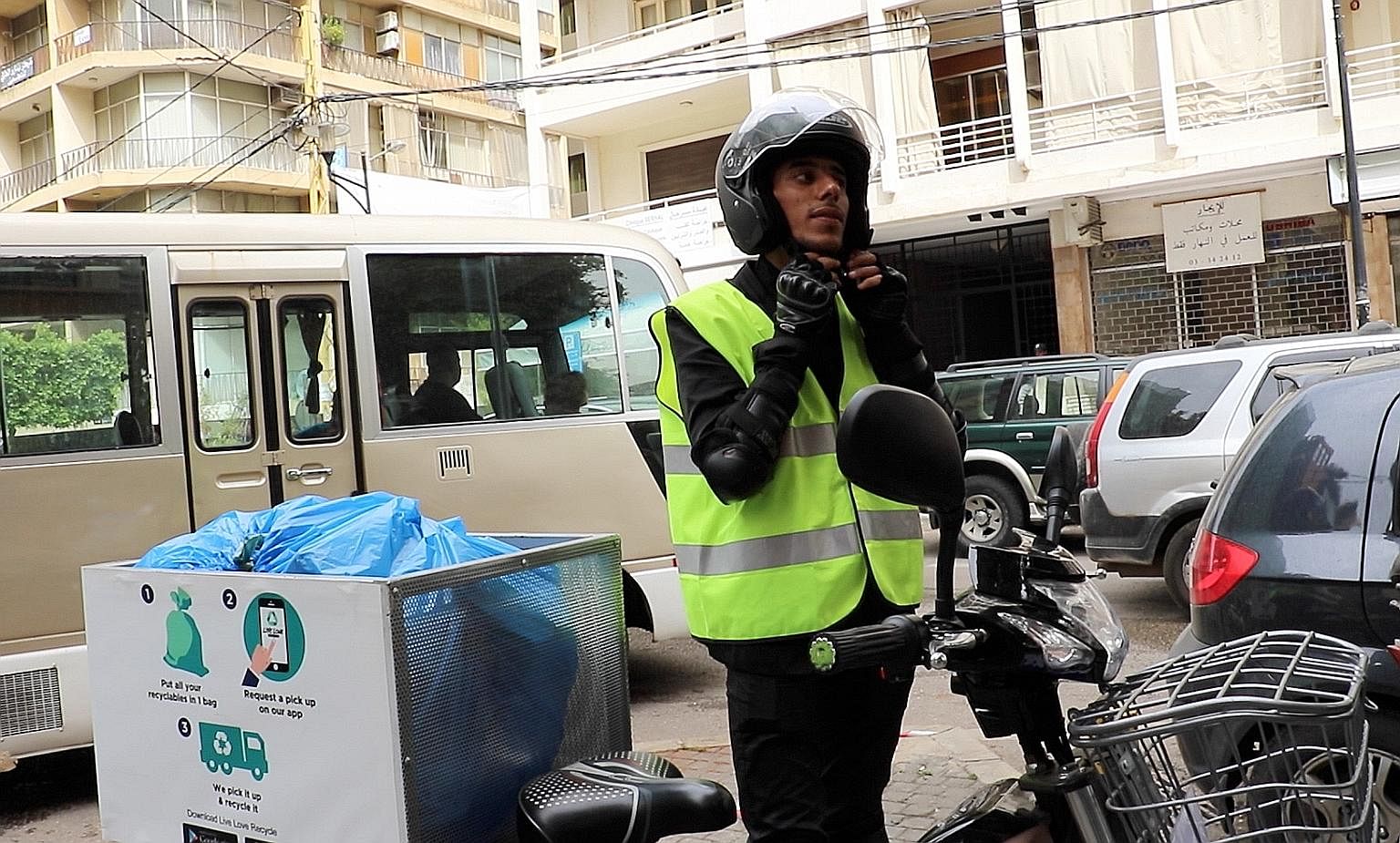 Syrian refugee Ibrahim Habach is one of 400 Live Love Recycle's e-bike couriers who collect recyclable waste in Beirut.