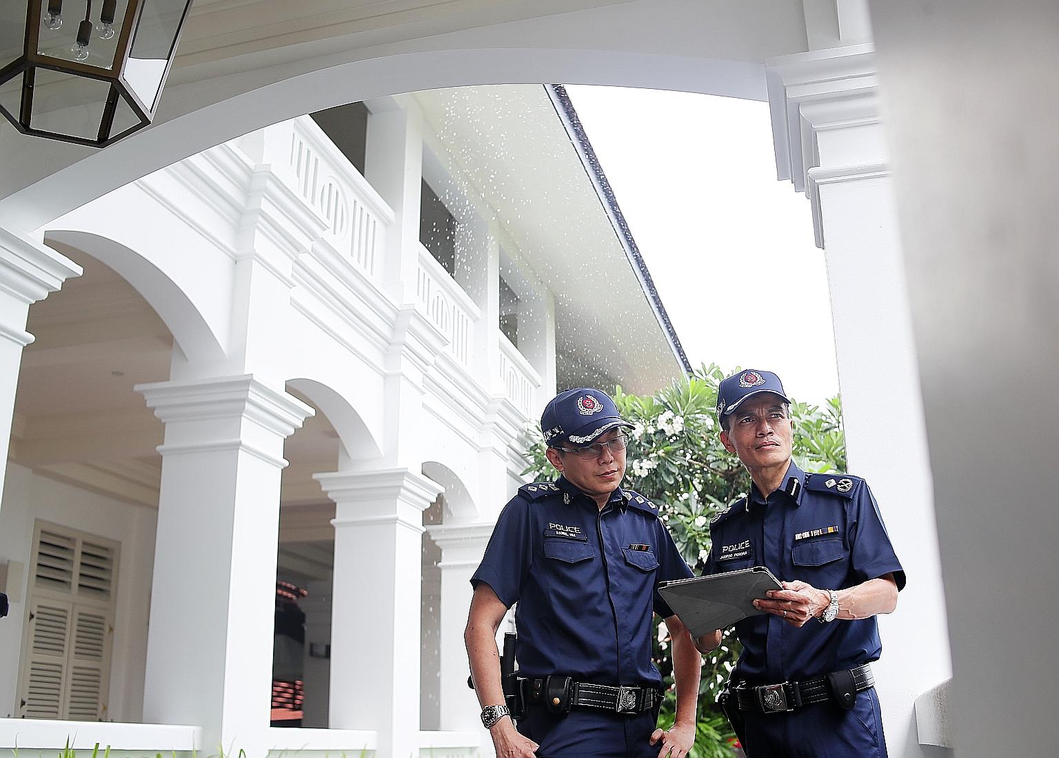 Assistant Commissioner Jarrod Pereira (right), commander of Clementi Police Division, and Superintendent Daniel Hui, Clementi police's head of operations, were involved in the operations at the Capella hotel.