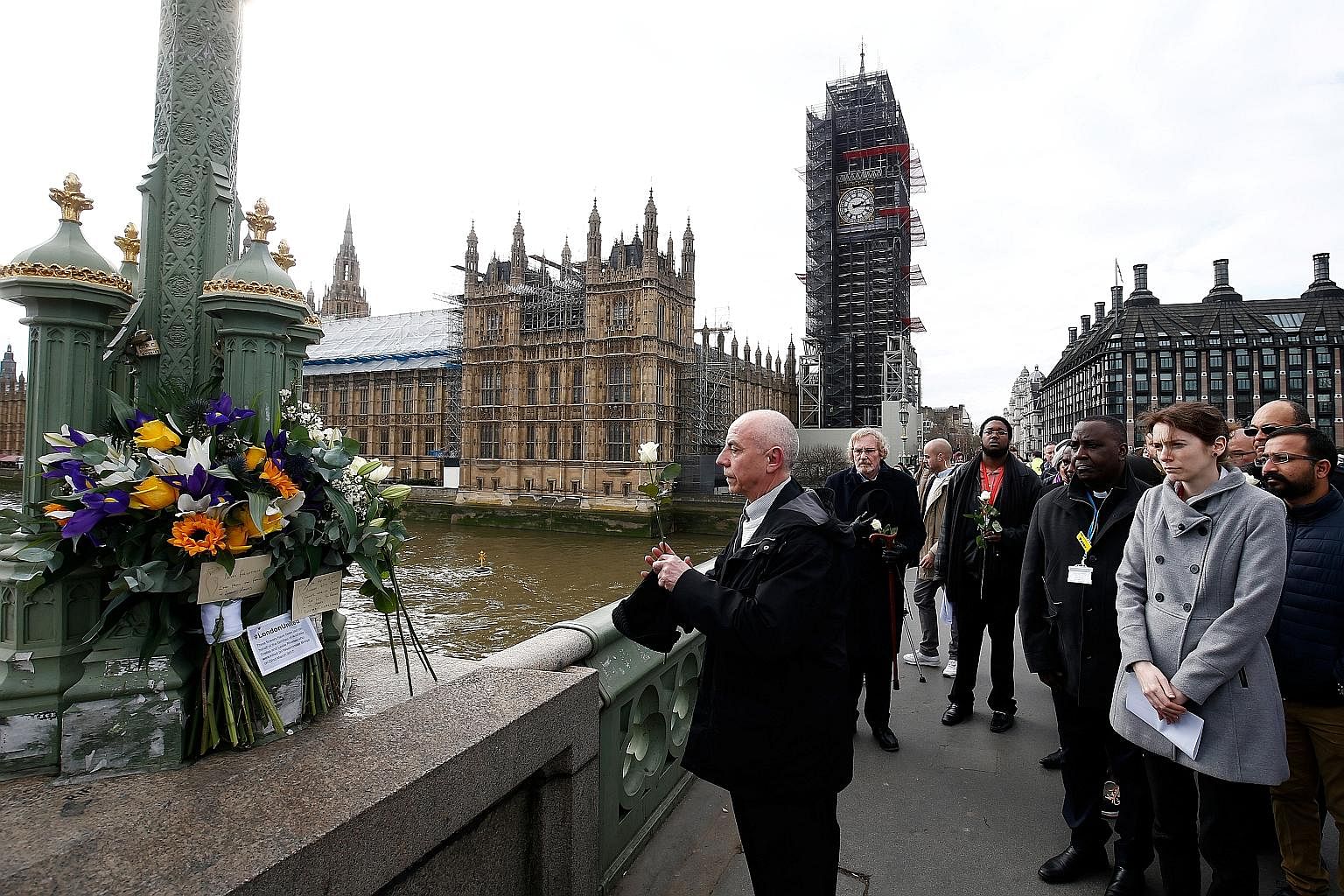 People marking the anniversary of last year's terror attack on London's Westminster Bridge.