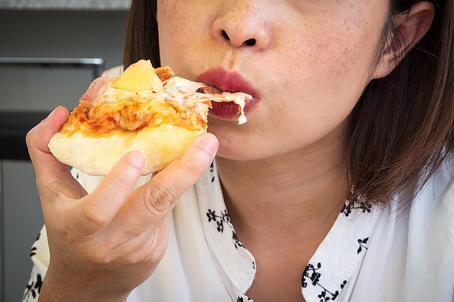 The findings suggest that the reward signal sent to the brain when fatty and carbohydrate-heavy foods, like pizza and macaroni and cheese, are consumed is more powerful than the sensation of satiation during eating.