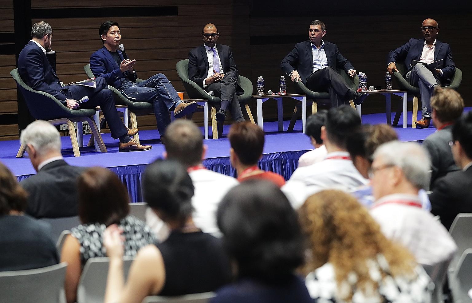 (From left) Moderator Torben Stephan of German think-tank Konrad Adenauer Stiftung; Mr Alvin Tan, Facebook's head of public policy for Asean, Malaysia and Singapore; Senior Minister of State for Communications and Information Janil Puthucheary; Mr Wa
