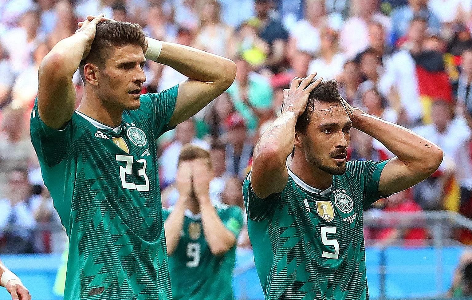 Defending champions Germany crashed out of the World Cup after a shock 0-2 Group F loss to South Korea yesterday. This is the first time the Germans have been eliminated in the first round since 1938. Sweden defeated Mexico 3-0 in the other match to 