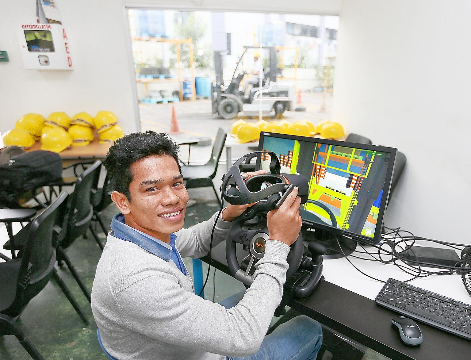 Stock taker Htet Win getting extra practice handling a forklift with the help of virtual reality.