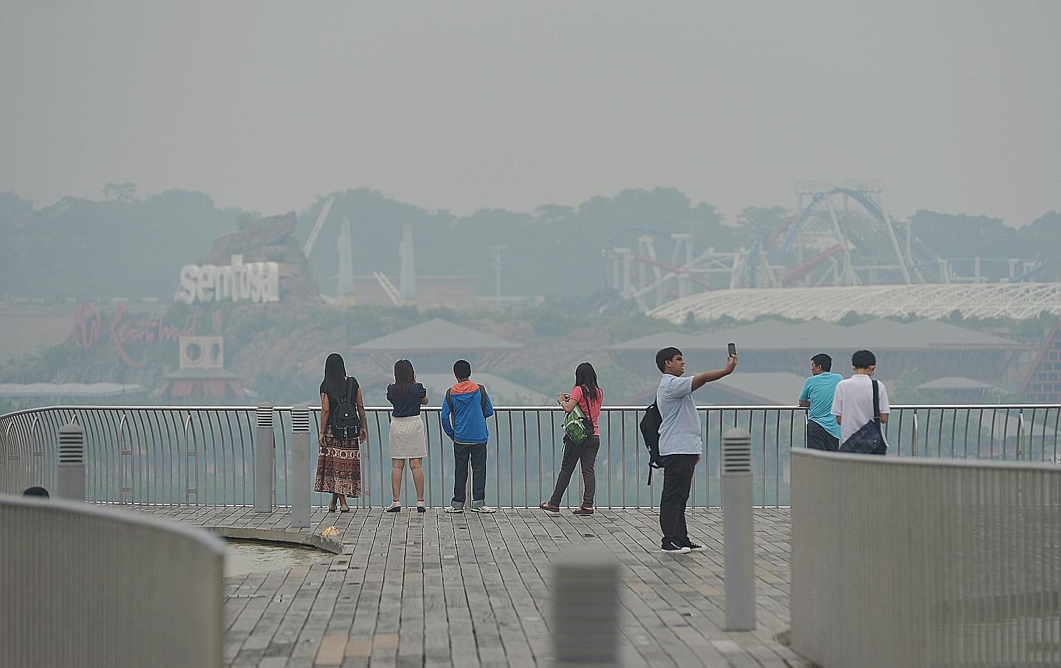 Singapore during the haze crisis in 2013. Ms Zhang Wen, executive director of People's Movement to Stop Haze, says haze in the region highlights the transboundary nature of climate change.
