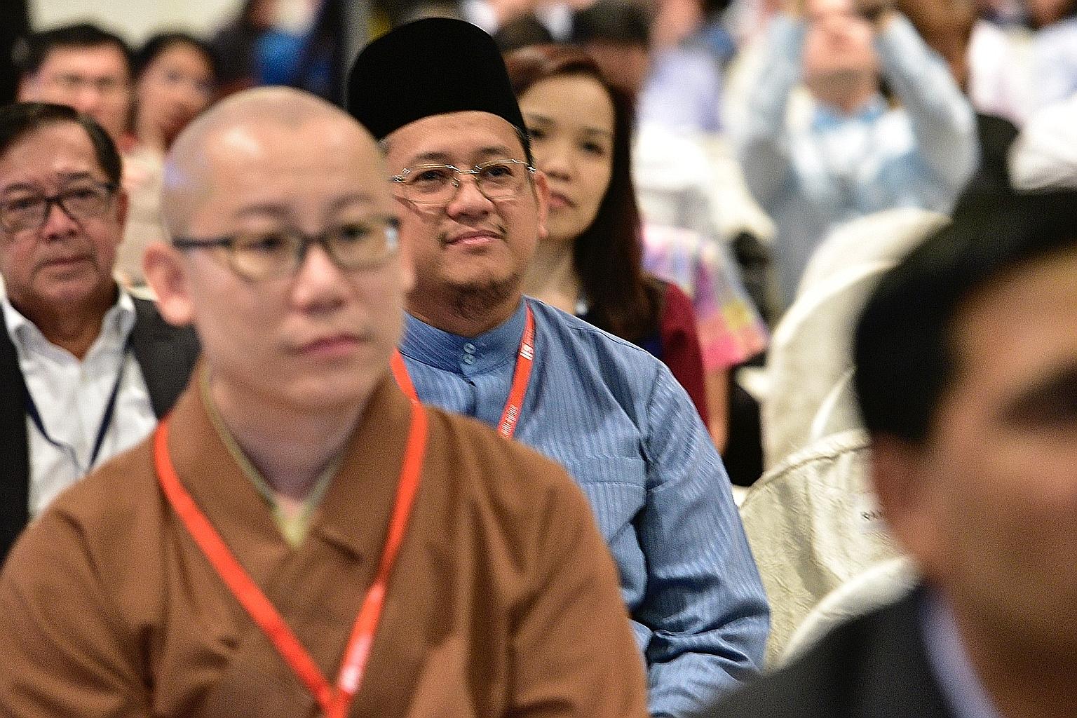 Mufti Fatris Bakaram (centre) at the Institute of Policy Studies forum, which focused on the role of the state and of religious leaders in fostering religious harmony in Singapore.