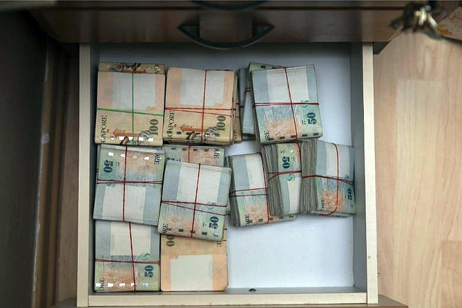 Besides $1.25 million in cash, computers, cellphones and documents were also seized by the police.