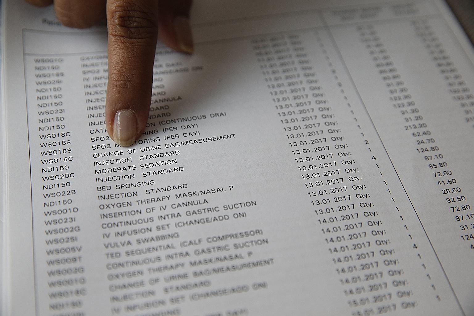 Madam Jayanthi Menon with the KKH bill for her sister Santhi Menon, which listed charges for even change of urine bag (below). The Australian was visiting her family in Singapore when she was struck down by excruciating pain in her abdomen.