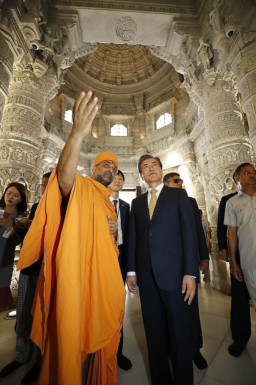 South Korean President Moon Jae-in visiting the Swaminarayan Akshardham Hindu temple in New Delhi on Sunday. He is set to hold a bilateral summit with Indian Prime Minister Narendra Modi today.