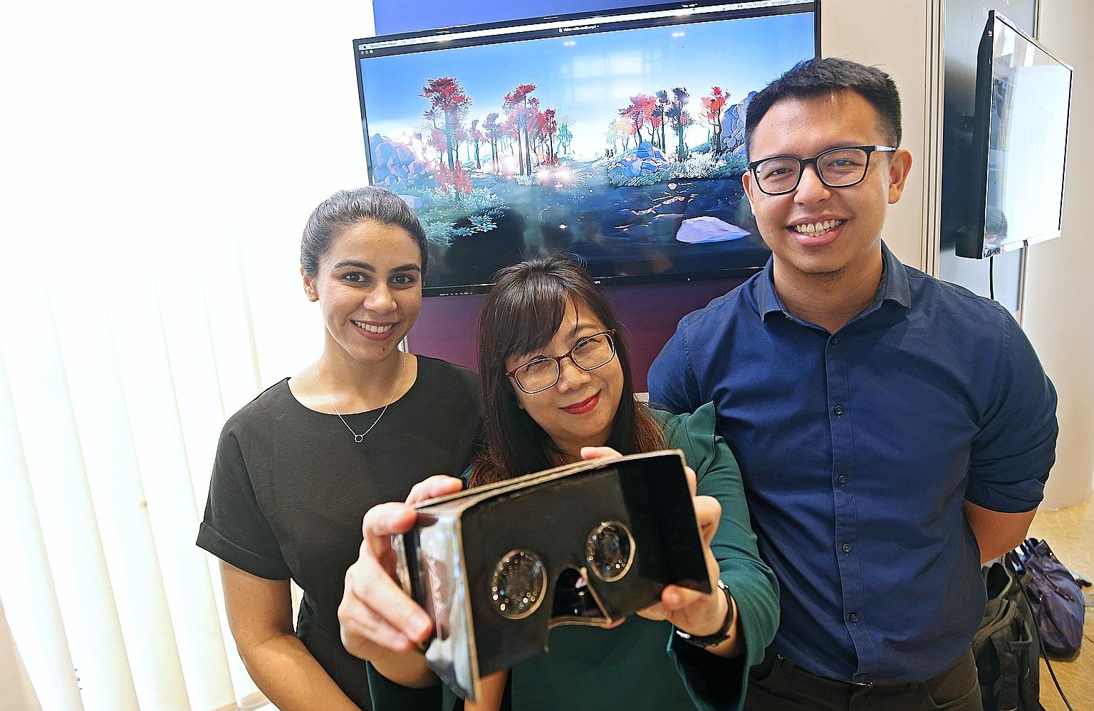 Mages Studio growth strategist Vrinda Bahl, SGH genetic counsellor Carol Loi and National Cancer Centre medical social worker Ng Yong Hao, with the headset that aims to reduce anxiety in patients facing surgery.