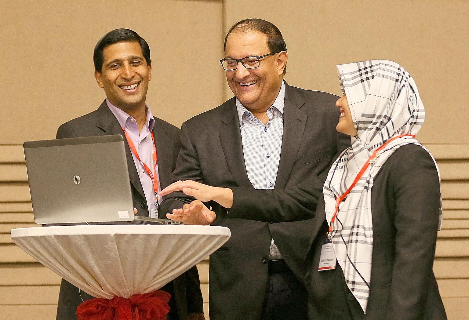 Minister for Communications and Information S. Iswaran (centre) with MP and OnePeople.sg management committee member Rahayu Mahzam and IPS senior research fellow Mathew Mathews at the launch of the Singapore Ethnic Mosaic Public Education Series by O