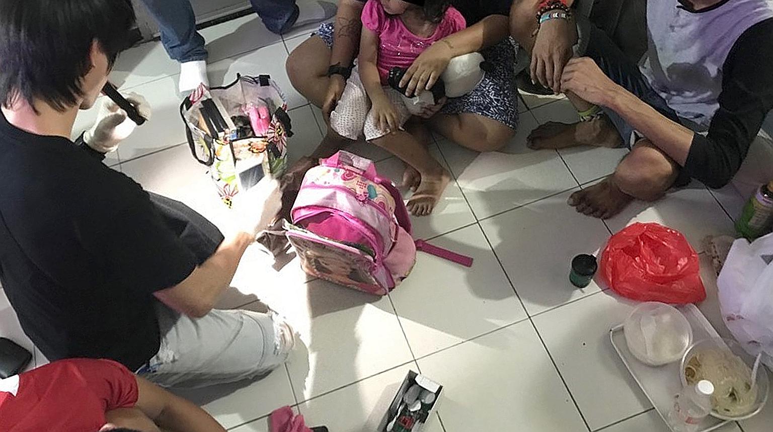 A four-year-old girl sitting on the lap of her mother who was busy getting high - that was the scene when CNB officers raided a one-room flat in Chin Swee Road last month.