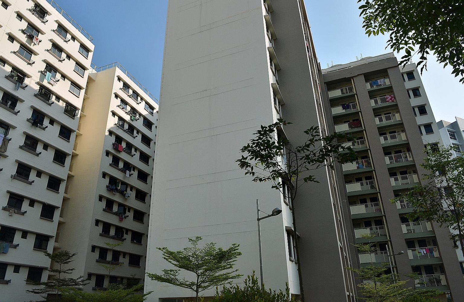 The Government has recently announced moves to improve the public rental flat system, which includes units such as these in Woodlands (left), by enhancing the delivery of social services and having new rental flats and sold flats in the same neighbou