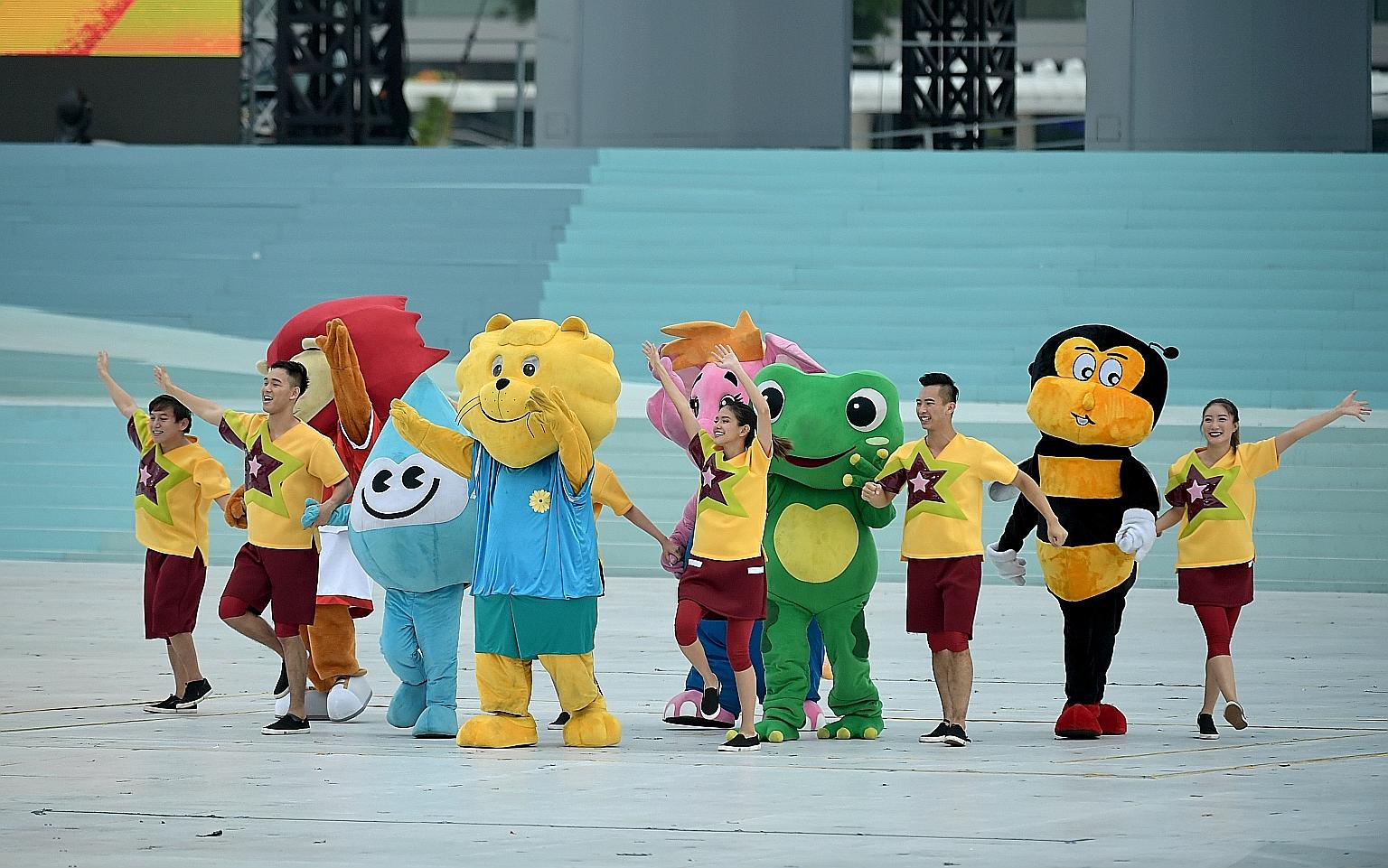 A dose of mascot magic helping to energise the audience during the pre-parade segment. The cuddly Singapore icons are (from left) Nila the Lion, Water Wally, Singa the Courtesy Lion, Sharity, Captain Green and Teamy the Bee.