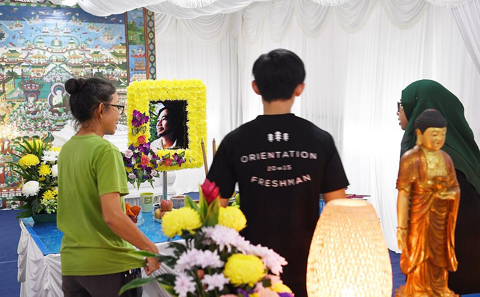 Visitors paying their last respects at the wake of Mr Tay Lai Hock, founder of non-profit organisation Ground-up Initiative, who died suddenly this week.