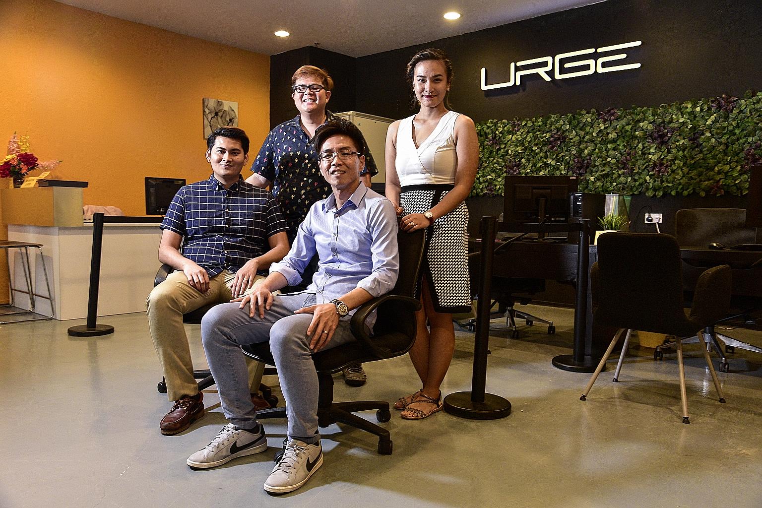 (Clockwise from left) Mr Muhammad Shabreen Hussain, who is spearheading Urge's Malaysian business, chief liaison officer Derrick Neo, marketing officer Sayat Sherlyn Parungao and chief operating officer Kelvin Ho. The firm has a fleet of about 100 ca