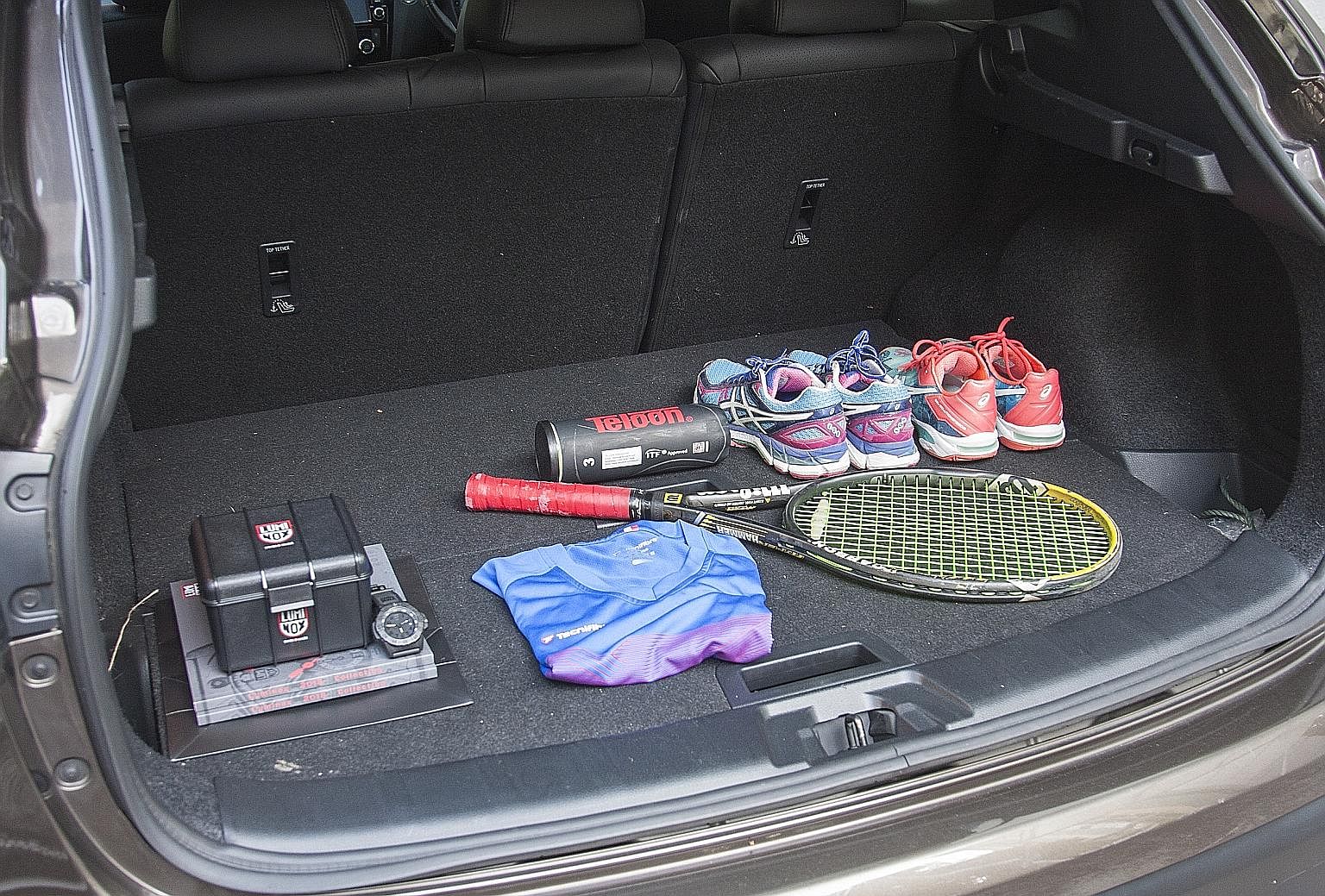 The roomy Nissan Qashqai is especially handy for Ms Pamela Tan when she has to transport large items for work.
