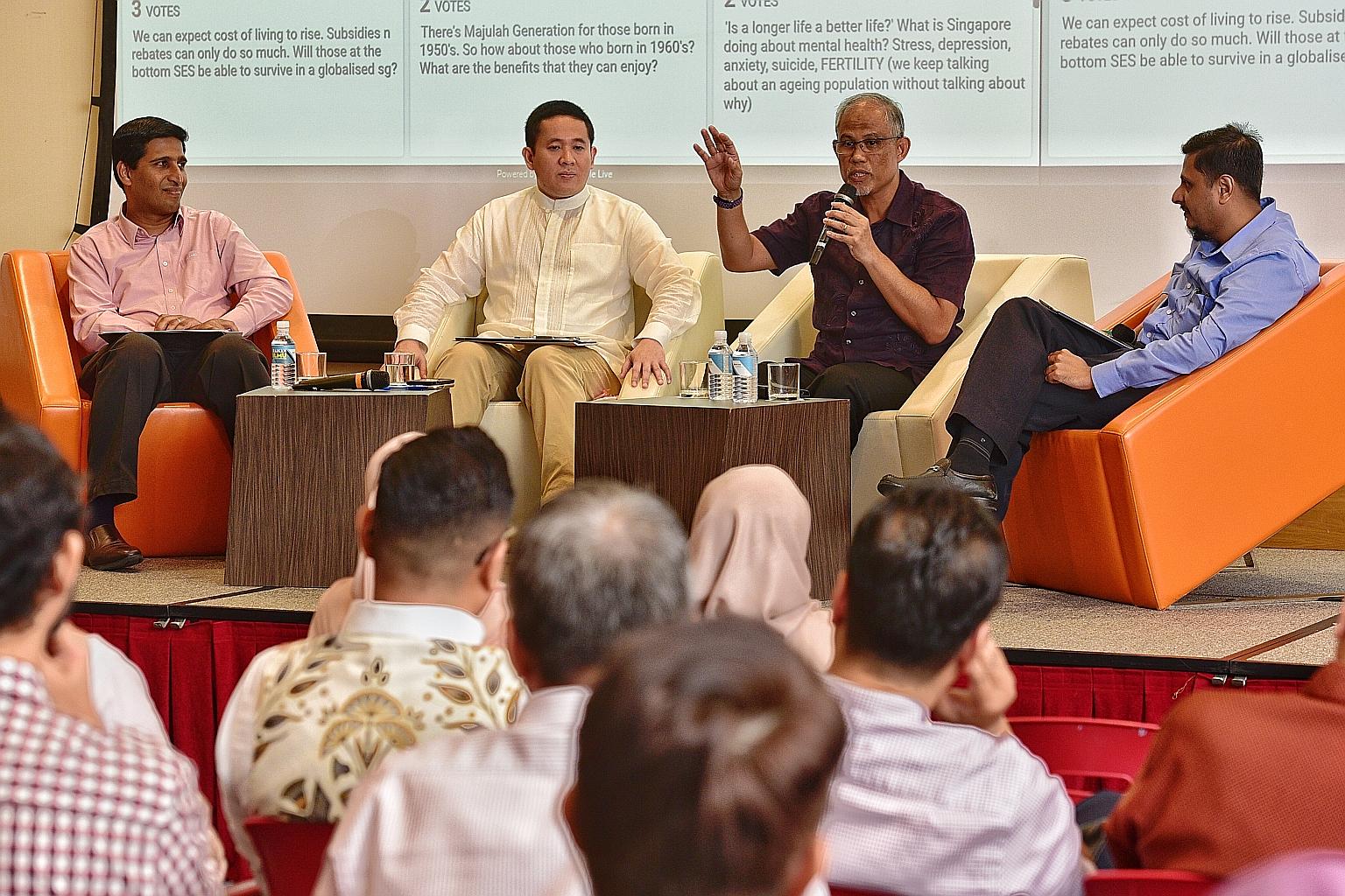 (From left) Dr Mathew Mathews of the Institute of Policy Studies, Senior Parliamentary Secretary Amrin Amin, Minister-in-charge of Muslim Affairs Masagos Zulkifli and Dr Mustafa Izzuddin of ISEAS - Yusof Ishak Institute at a panel discussion at Menda