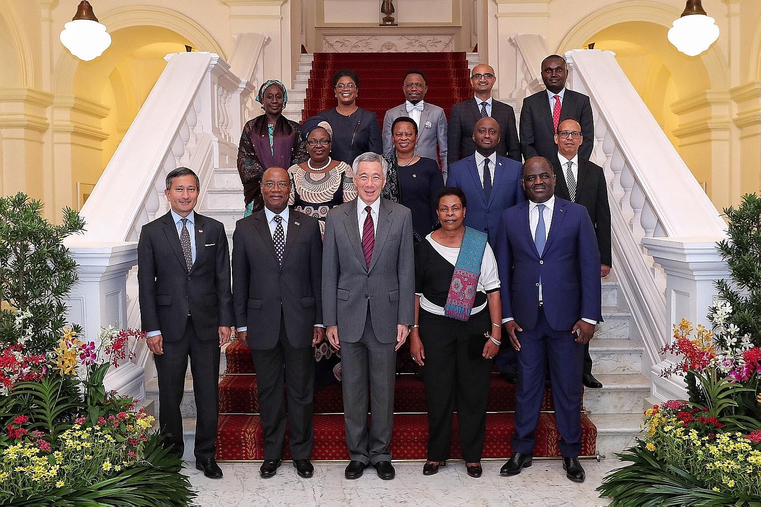 Twelve ministers from African countries with Prime Minister Lee Hsien Loong and Foreign Minister Vivian Balakrishnan at the Istana as part of a two-day visit that began on Monday. Mr Lee and the ministers representing Djibouti, Ethiopia, Gabon, Ghana