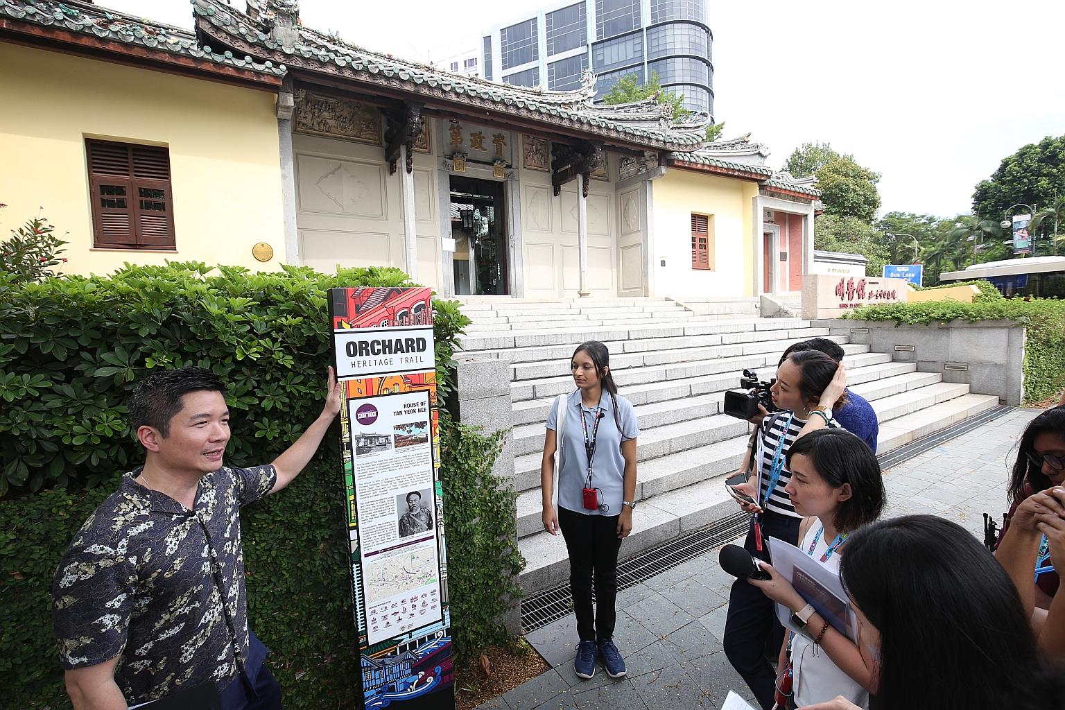NHB's assistant chief executive (policy and community) Alvin Tan talking to the press outside the House of Tan Yeok Nee, which was completed in 1885. It is the last remaining Teochew mansion in Singapore.