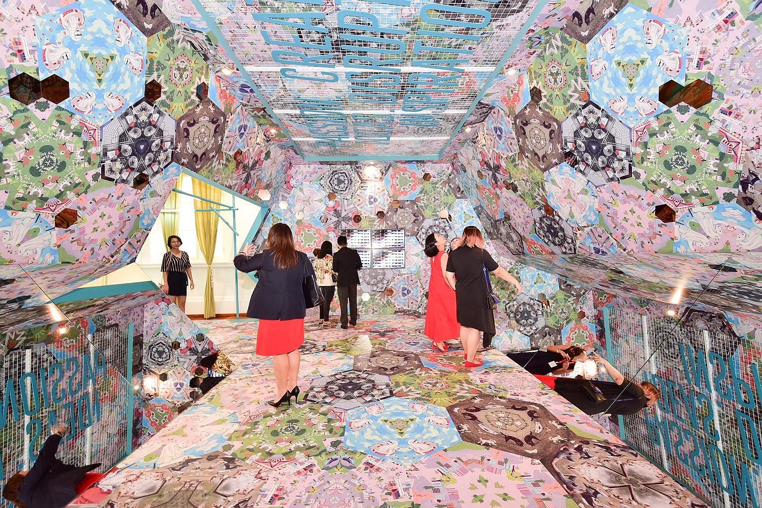 Visitors were given a chance to experience the Kaleidoscope Tunnel, an installation by Singapore-based artists Esther Goh, Eugene Soh and Fong Qi Wei, at the launch of the Singapore Tourism Board's (STB) new marketing campaign at the Arts House yeste