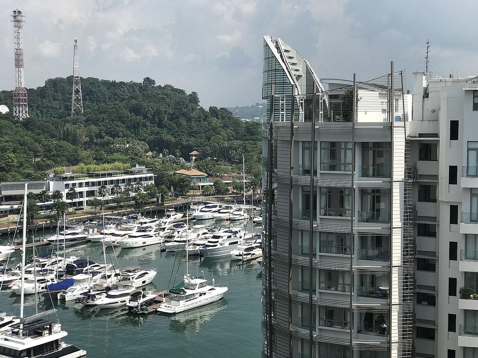The 11th-storey duplex penthouse (top right), which was relisted several times over the past three years, was eventually sold by Edmund Tie & Company to Kenyan diplomat Neal Manilal Chandaria, whose family is in the process of moving in. The buyer vi
