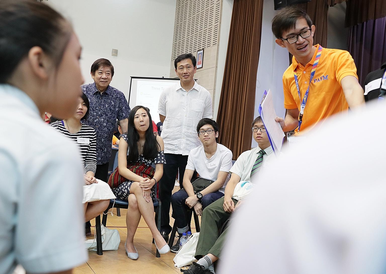 More than 200 young people from Sembawang GRC participated in a post-National Day Rally dialogue hosted by grassroots advisers yesterday. At the session were Minister for Transport Khaw Boon Wan (left) and Minister for Education Ong Ye Kung (centre).