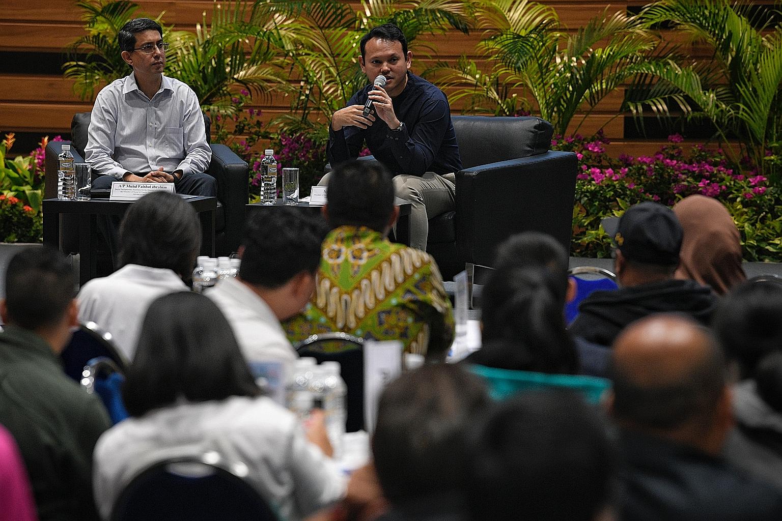 Minister of State for Manpower Zaqy Mohamad (right) with Senior Parliamentary Secretary for Social and Family Development and Education Muhammad Faishal Ibrahim, at a post-National Day Rally dialogue with Malay/Muslim community leaders yesterday.