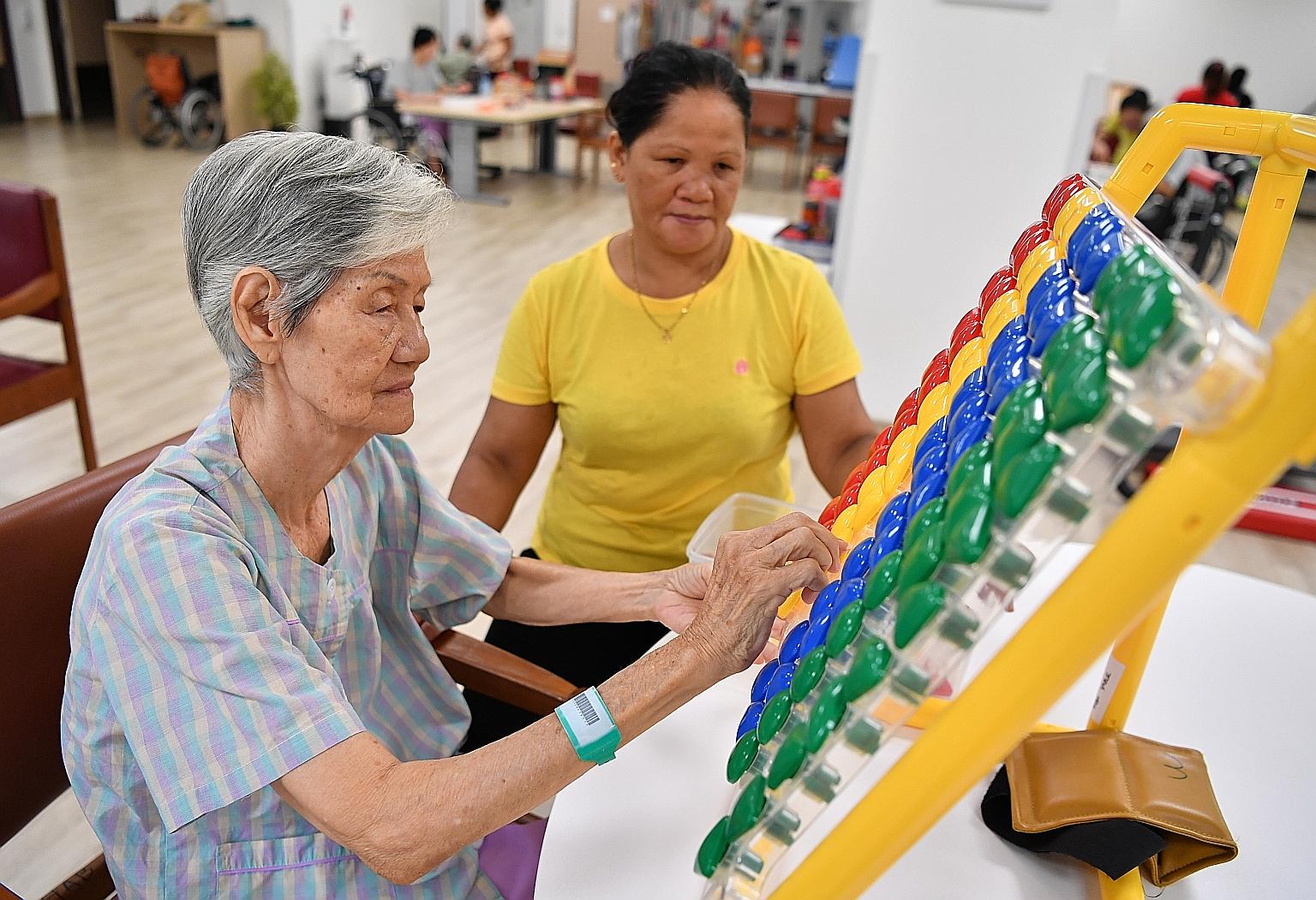 An elderly patient at the Kwong Wai Shiu Hospital, where the new Community Training Institute has been set up.