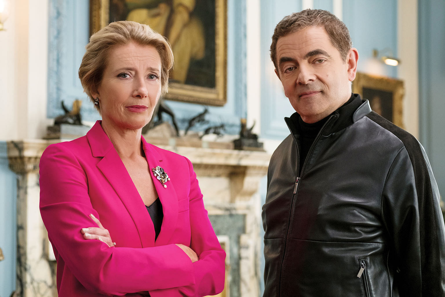 Emma Thompson (above, left) joins Rowan Atkinson, who plays the British secret service's last hope, in Johnny English Strikes Again (right).