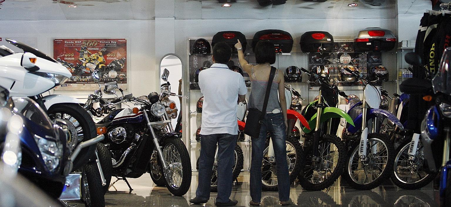 Senior Minister of State for Transport Lam Pin Min said the 305 bids for motorcycle certificates of entitlement received in the last two minutes of the bidding on Aug 8 came from 25 different parties.