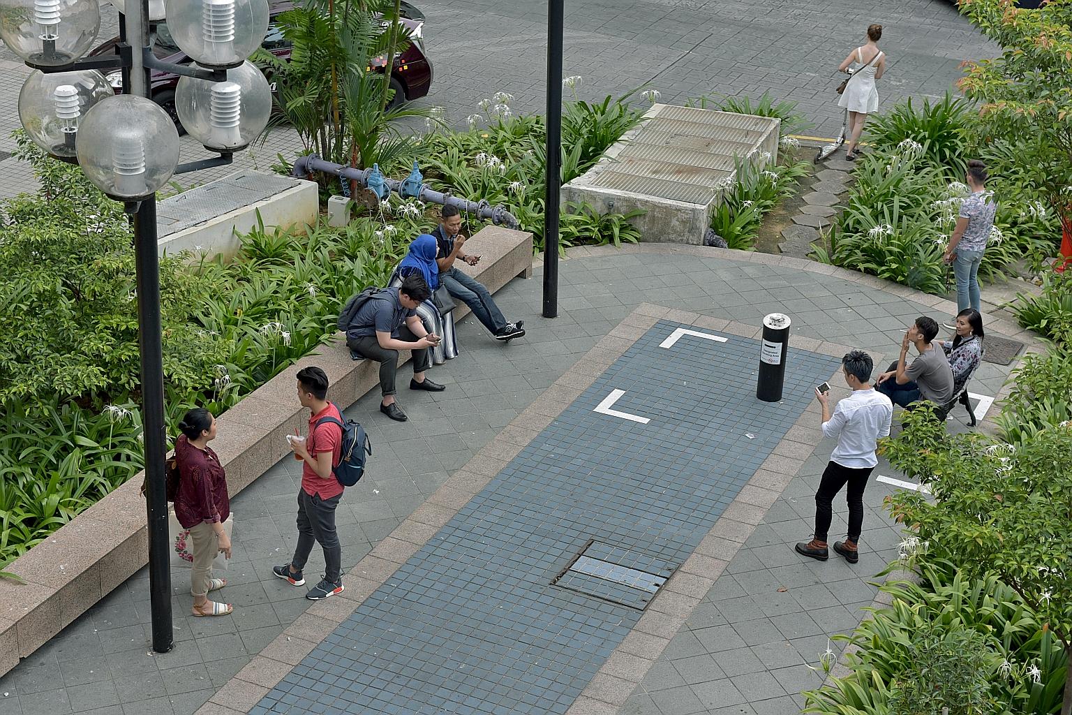 A designated smoking area in front of Far East Plaza. NEA has been given the power to officially designate Orchard Road as a non-smoking zone, as the precinct prepares to ban public smoking by the end of the year.