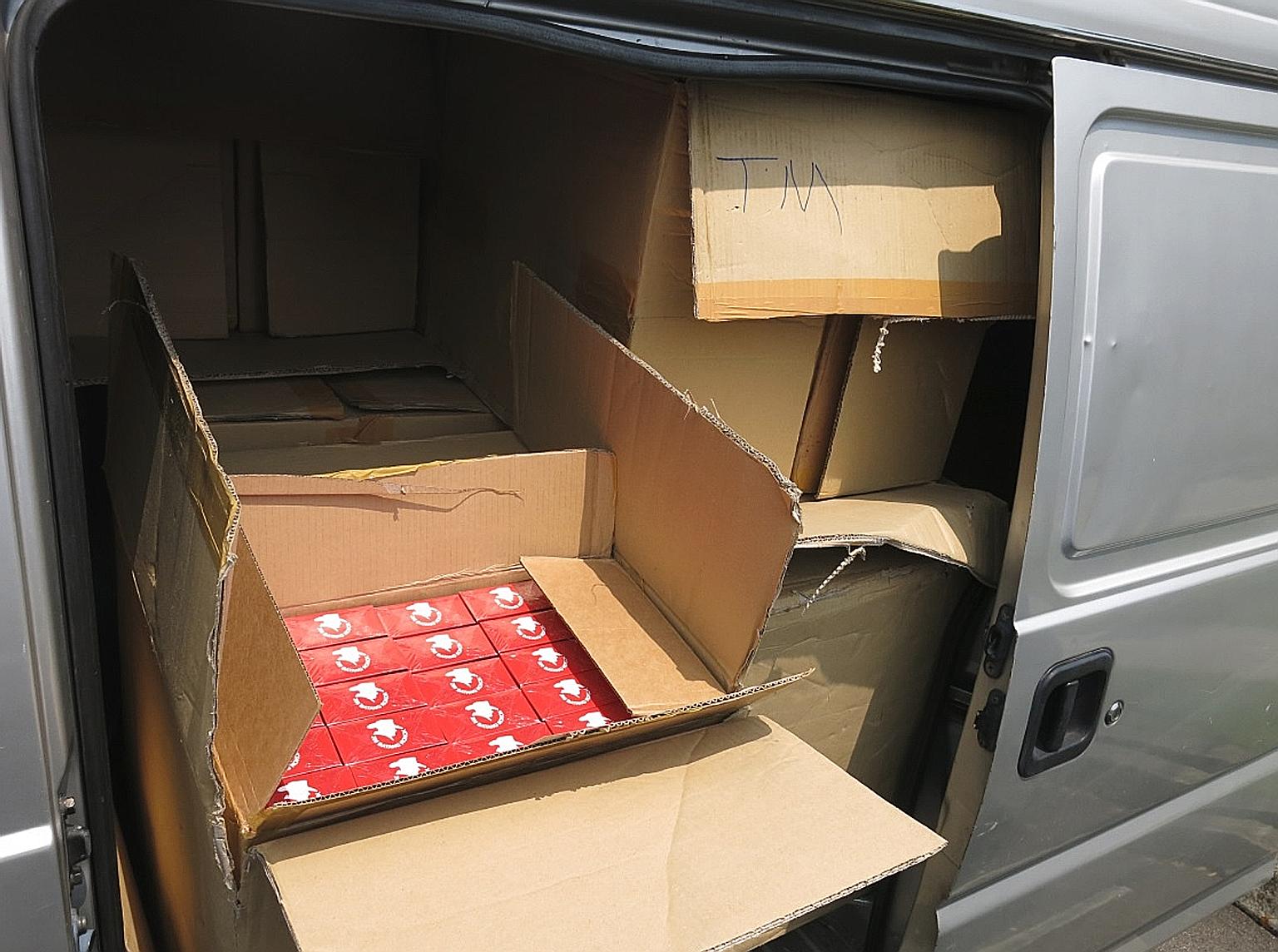 Some of the cartons of cigarettes seized in two Singapore Customs operations last week. The total duty and GST evaded in both cases amounted to $1,061,340.