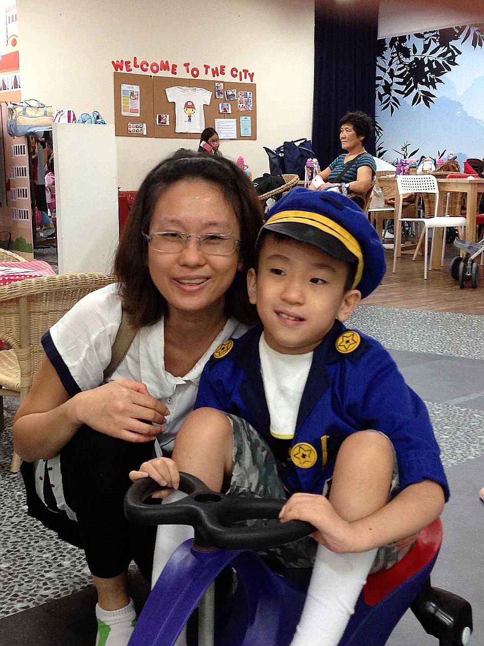 Madam Serene Poh with her son, Jayden Tan, 12, who was diagnosed with Pura syndrome by KKH doctors using the gene-sequencing test.