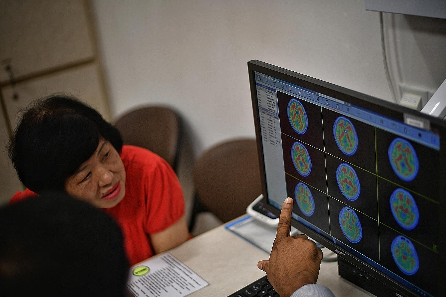 Retiree Margaret Tan was found to have harmful amyloid proteins in her brain, which could be a precursor to Alzheimer's disease. She is taking part in a clinical trial of anti-amyloid drugs, and keeping herself fit, healthy and socially active to sta