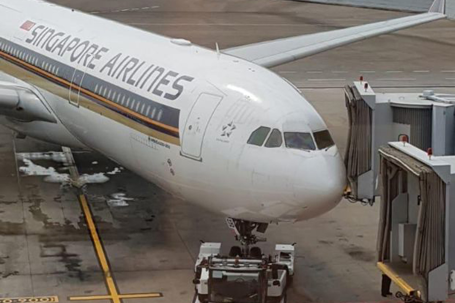 The front body near the nose of the Airbus 330-300 hit one of two aerobridges that were used for boarding on Tuesday.