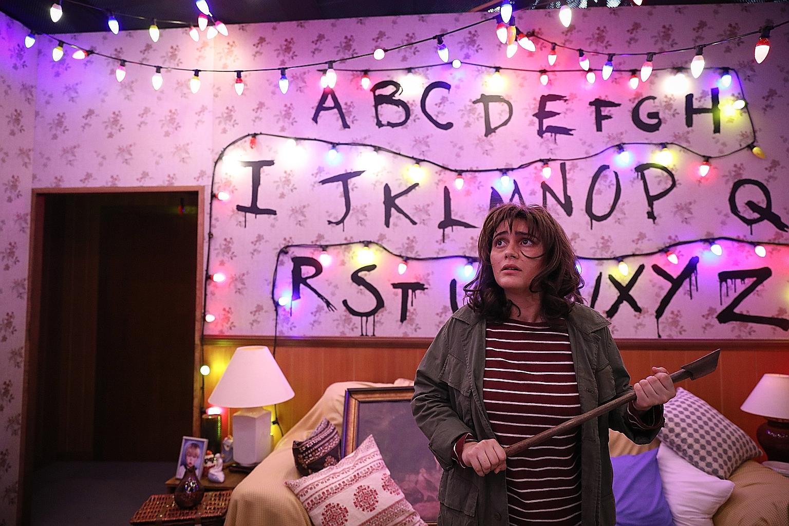 An actress playing Joyce Byers, a character from Netflix's television series Stranger Things, at the media preview of Universal Studios Singapore's Halloween Horror Nights 8. This year's edition features five haunted houses, including Stranger Things