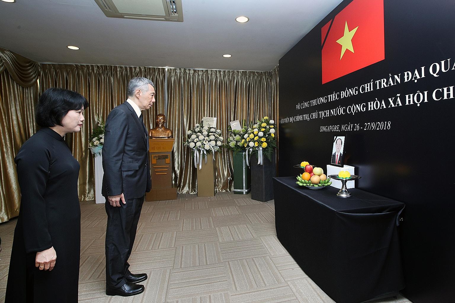 In his condolence message, Prime Minister Lee Hsien Loong (seen here with Vietnamese ambassador to Singapore Tao Thi Thanh Huong) said the late Vietnamese President Tran Dai Quang dedicated his life to serving his beloved country, improving the lives