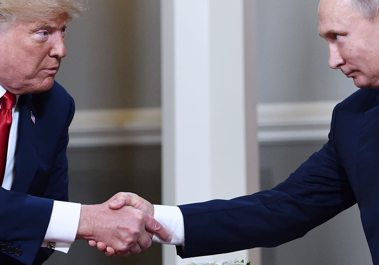 US President Donald Trump (far left) and Russian President Vladimir Putin at the Helsinki summit in July. Russian operators were accused of manipulating social media to disseminate disinformation during the 2016 US presidential election, which Mr Tru
