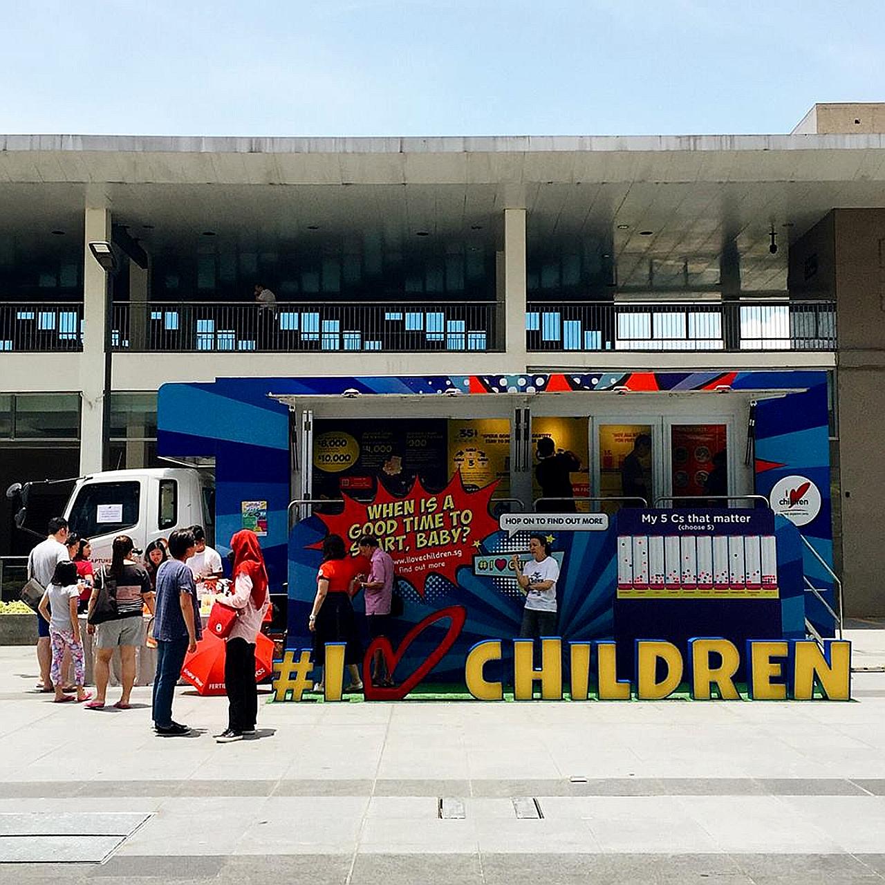 I Love Children's Truck-on-the-Go, which educates visitors on managing one's finances and understanding fertility issues, at Hillion Mall last Saturday. It will make more stops in more areas this and next month.