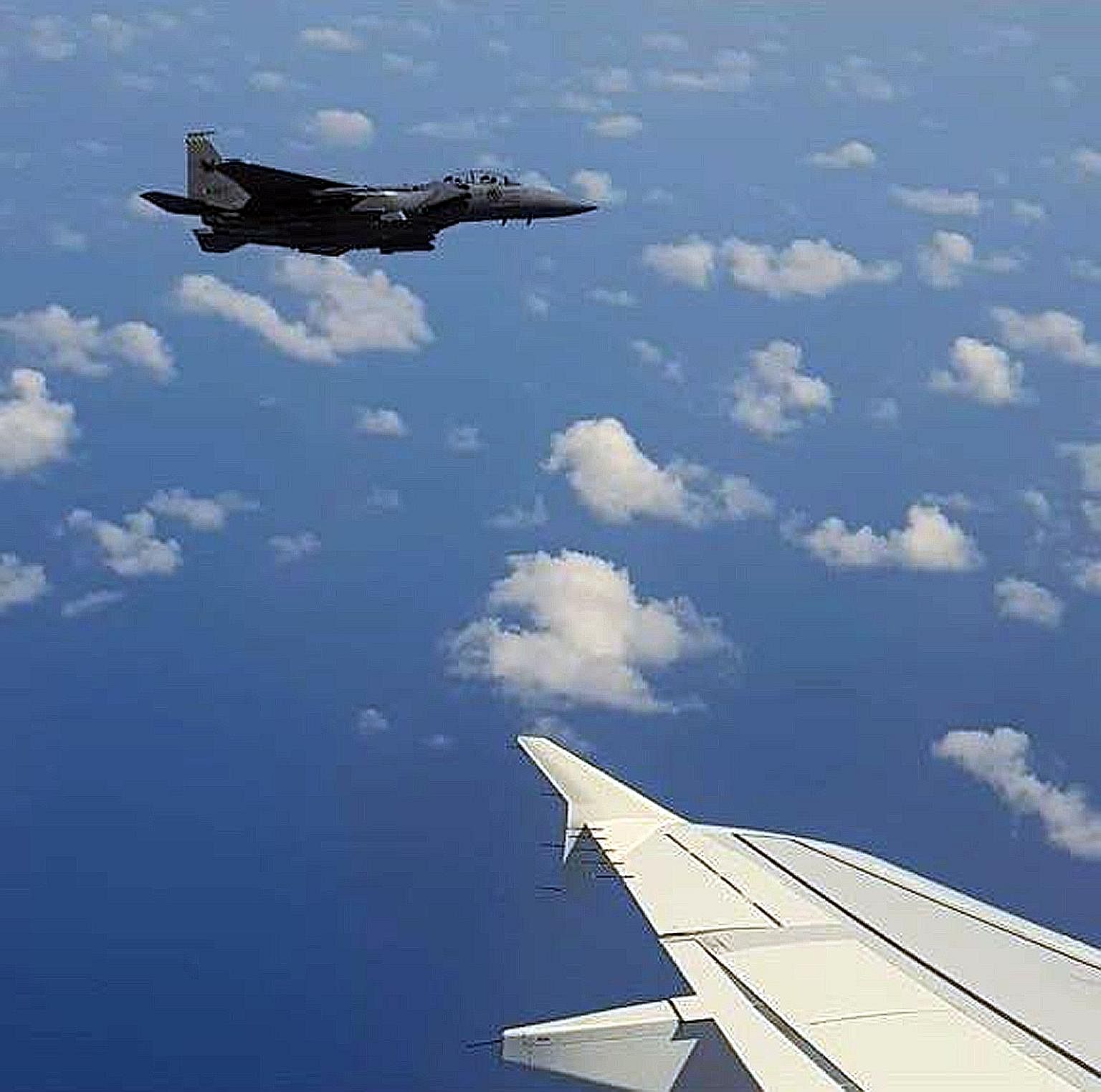 Above: One of the RSAF fighter jets that escorted Scoot Flight TR634 as it entered Singapore airspace on April 5, after passenger Hsu Chun Meng said he had a bomb in his bag. Left: The plane landed at a remote area away from the main Changi Airport t