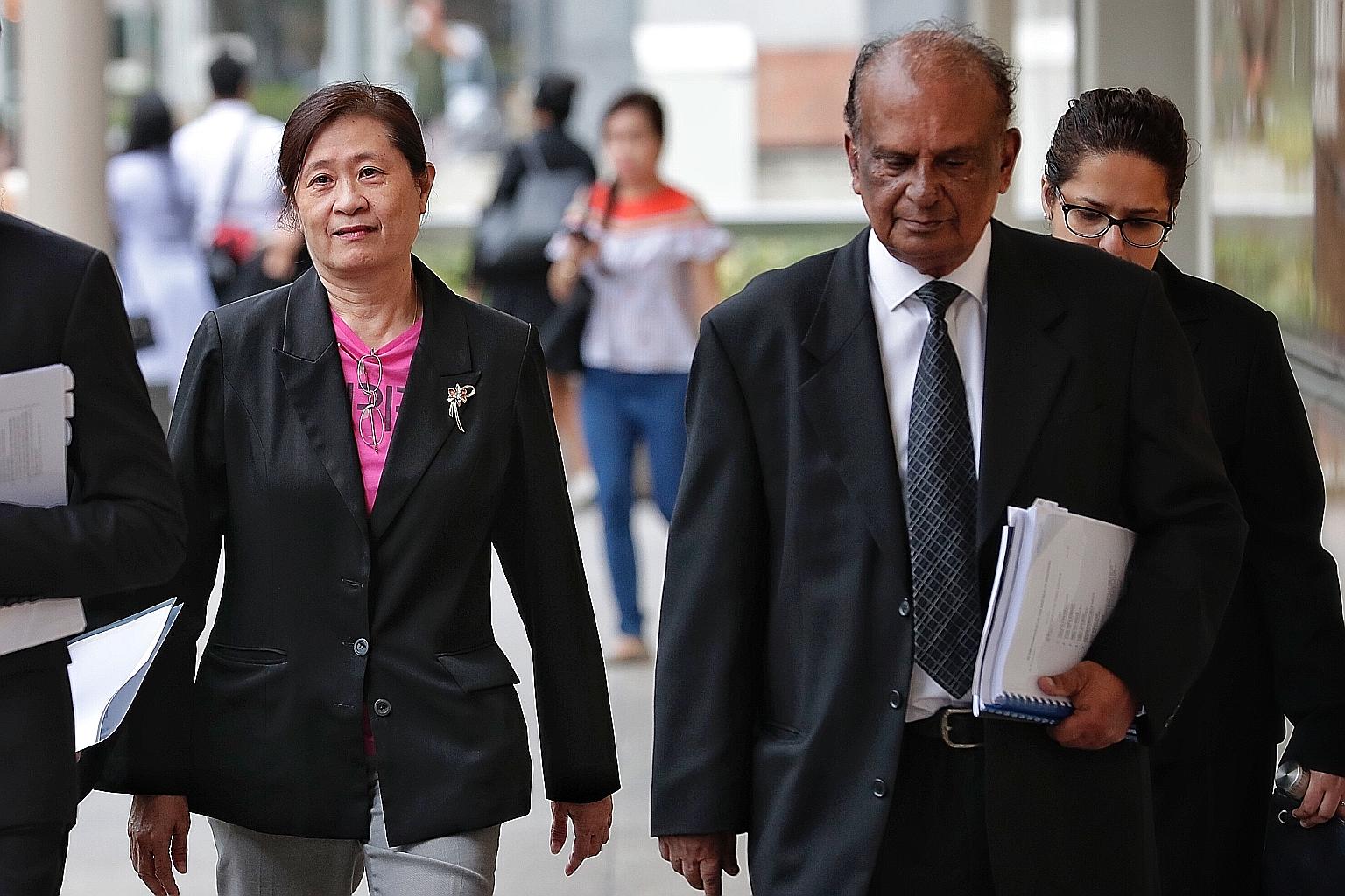 Ms How Weng Fan and lawyer Leslie Netto, who is representing Ms How and FM Solutions & Services (FMSS), arriving at the Supreme Court yesterday. The court heard yesterday that the decision to appoint FMSS was made in the weeks following the May 7 Gen