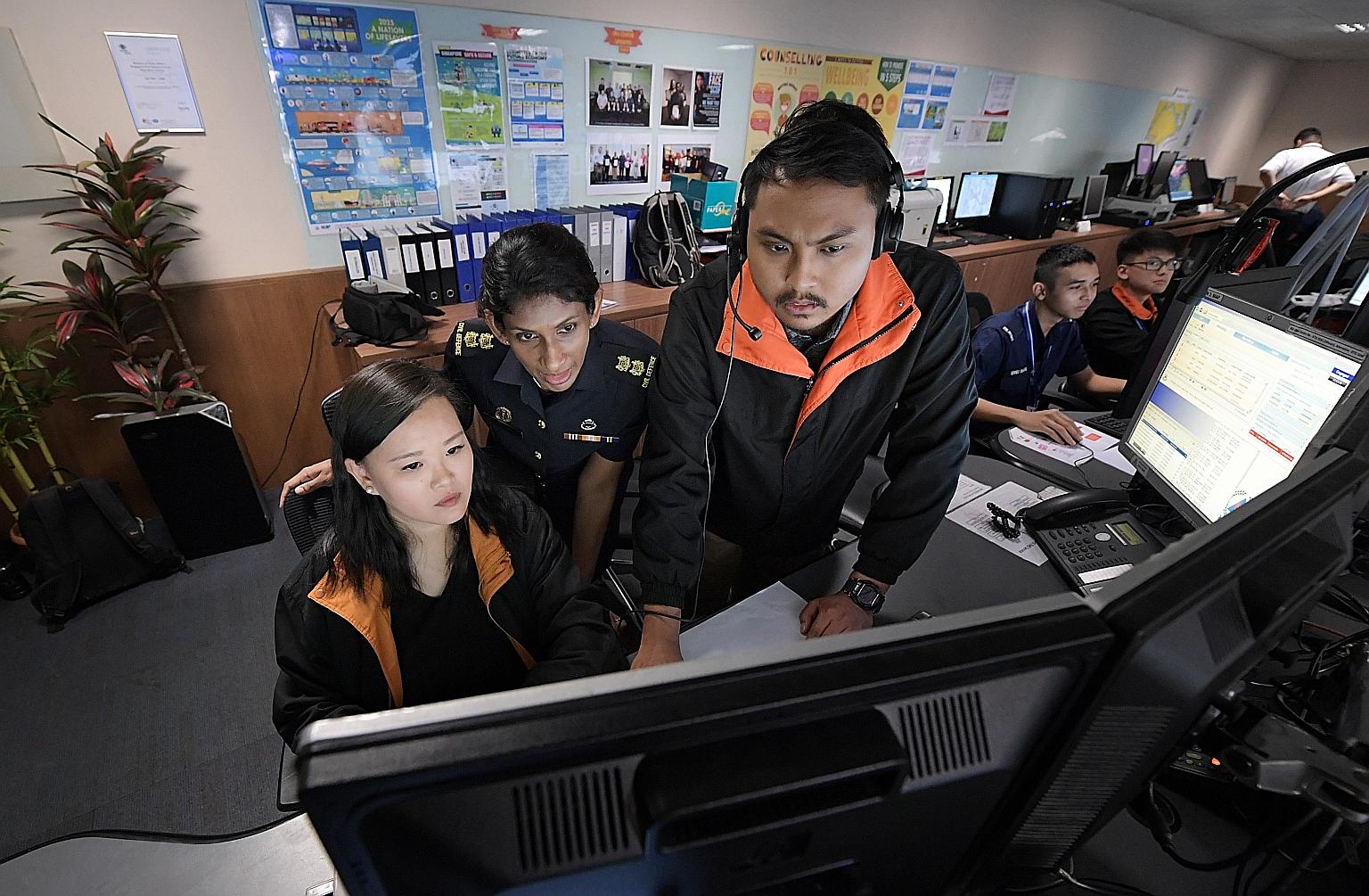 (From left) Senior staff nurse Geraldine Goh, SCDF chief medical officer Shalini Arulanandam and senior staff nurse Muhammad Firman Muliadi at the SCDF operations centre in Ubi Avenue 4. Lieutenant-Colonel Shalini said the nurses have helped to impro
