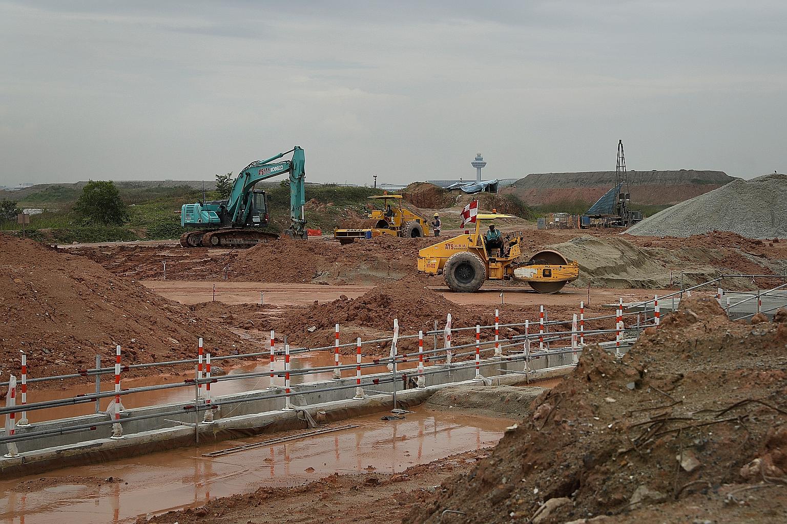 Construction work can be seen going on at the site for Changi Airport's Terminal 5. By the time the Changi East project - expected to cost tens of billions of dollars - is completed around 2030, Changi Airport will have almost doubled in size to cove