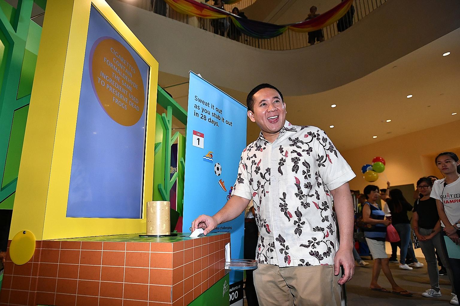 Senior Parliamentary Secretary for Health and Home Affairs Amrin Amin launching the new campaign at Heartbeat@Bedok yesterday. It will focus on health, family and finances to motivate smokers to quit.