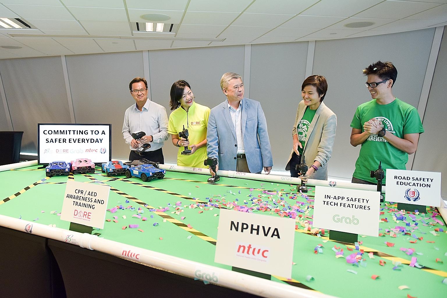 (From left) Mr Simon Lim, divisional director at the Health Promotion Board; Dr Jade Kua, programme director of Dare, Unit for Pre-Emergency Hospital Care, Singapore General Hospital; Mr Ang Hin Kee, an MP for Ang Mo Kio GRC; Ms Tan Hooi Ling, co-fou