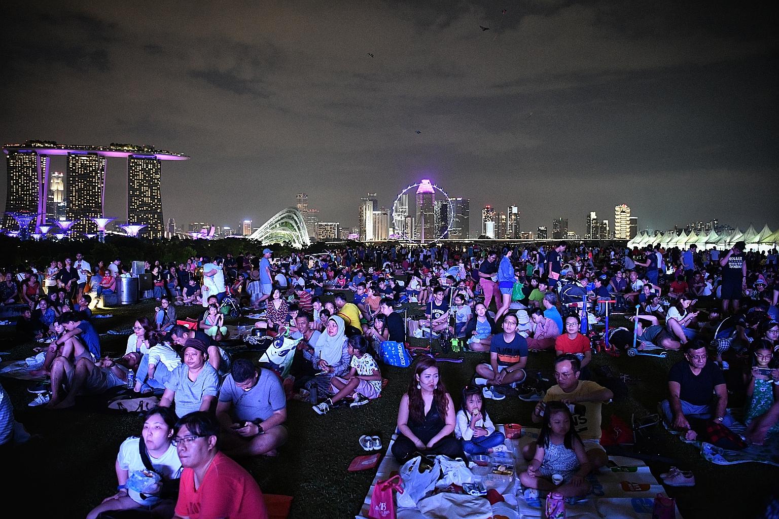 Visitors at the Marina Barrage 10th Anniversary Celebrations gathered at the Green Roof yesterday to enjoyperformances such as the LED water percussion, a sand art video show by artist Stacey Lee and a fireworks display. They also saw the unveiling o