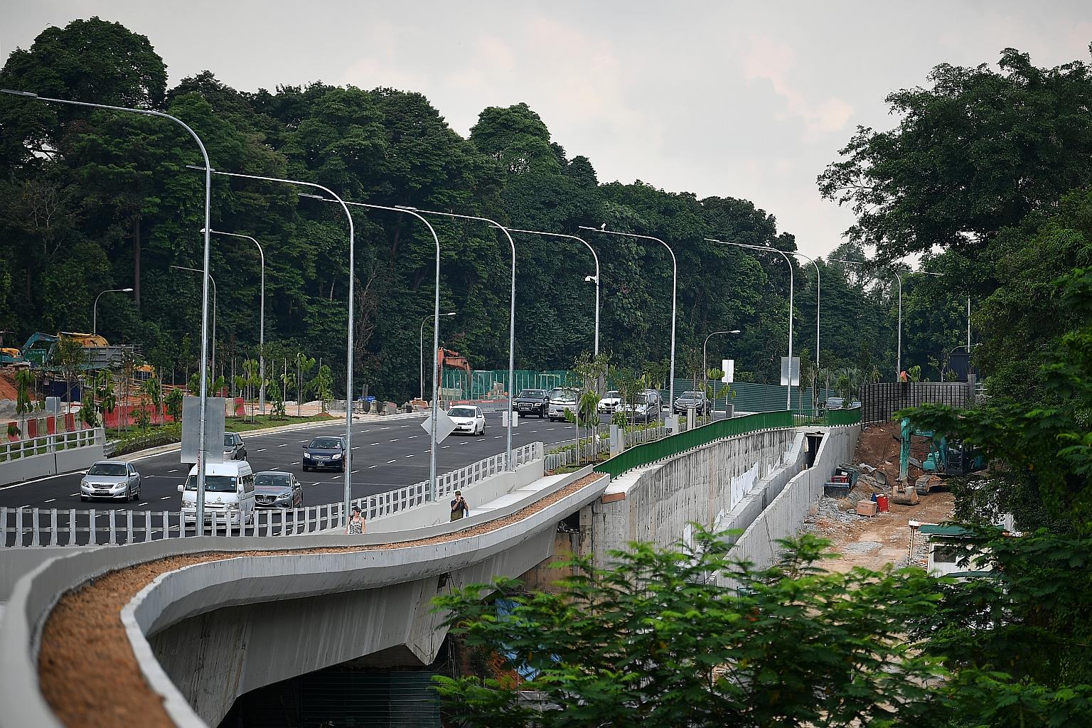 Vehicles travelling along the southbound Lornie Highway yesterday. The northbound part of the highway will be completed in phases.