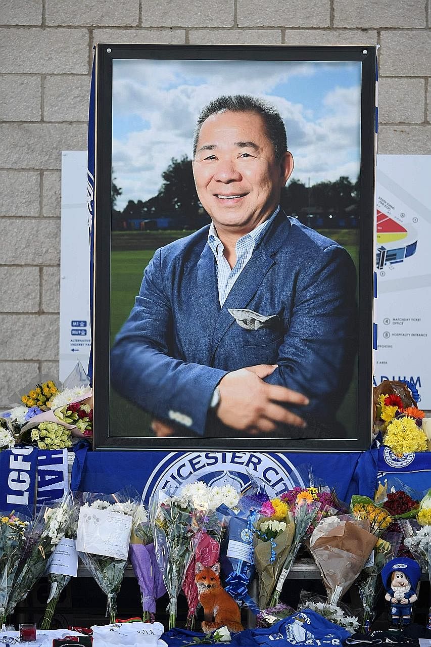 Pilots Eric Swaffer and Izabela Roza Lechowicz were among those who died in last Saturday's crash. Above: A portrait of Leicester City's chairman Vichai Srivaddhanaprabha at the King Power Stadium in the English city yesterday, surrounded by floral t